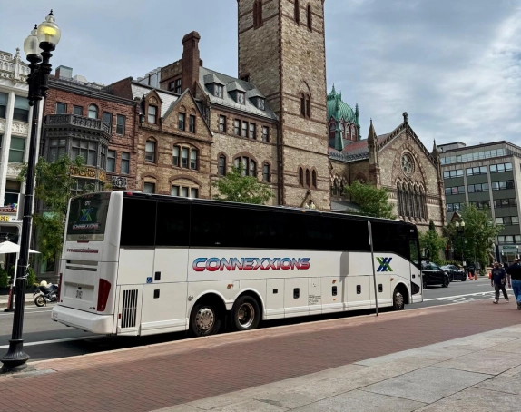 Modern charter bus rental by Connexxions Bus in Tennessee