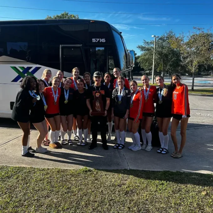 Team transportation Sports team transportation - athletes boarding a Connexxions charter bus